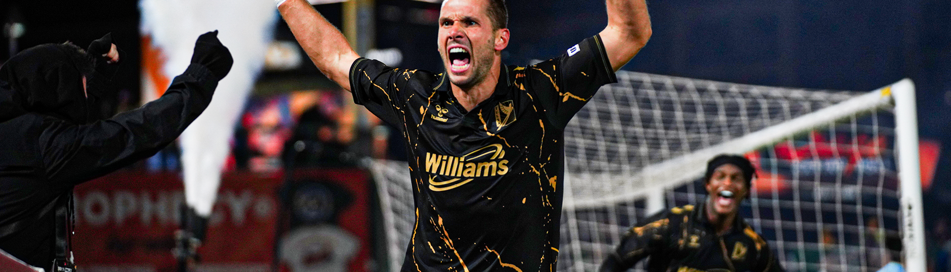 Edited image of FC Tulsa forward Stefan Lukic celebrating a goal