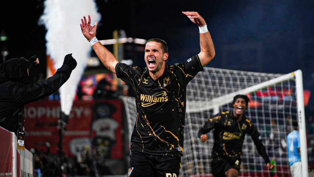 Edited image of FC Tulsa forward Stefan Lukic celebrating a goal